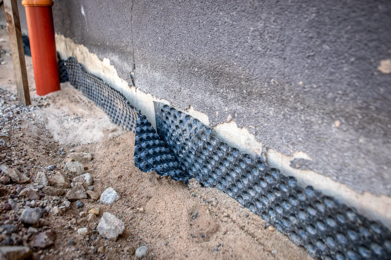 Dimpled drainage membrane on a foundation wall by Promaster Maintenance Corp, Long Island, NY