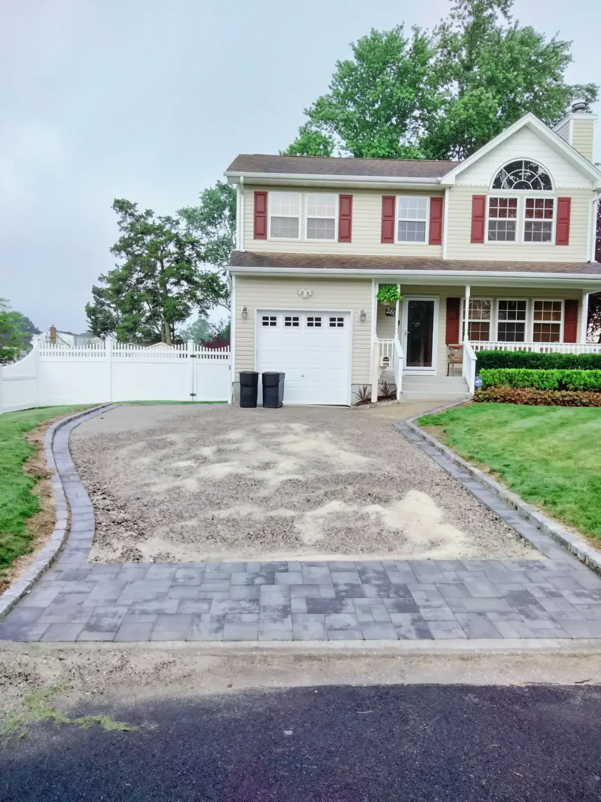 Paver apron over a compacted driveway base by Promaster Maintenance Corp, Long Island, NY