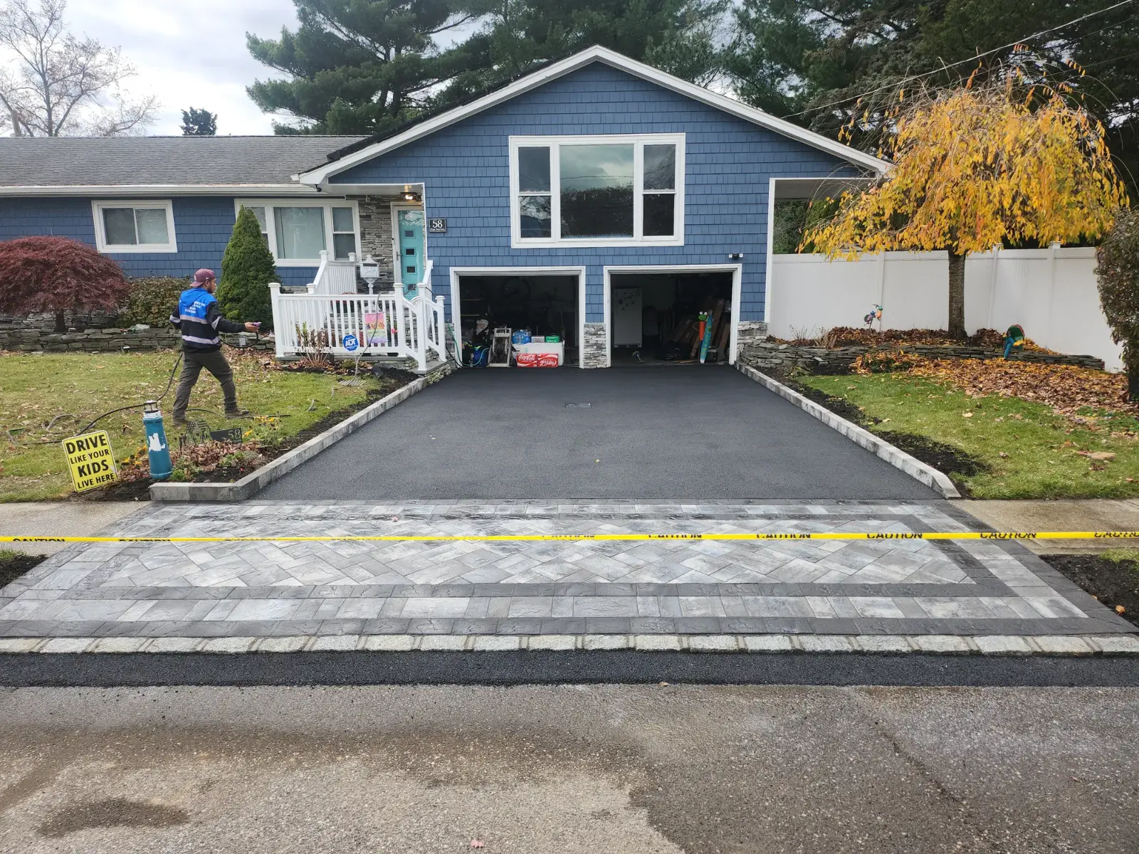 Driveway replacement with paver apron by Promaster Maintenance Corp, Long Island, NY, after
