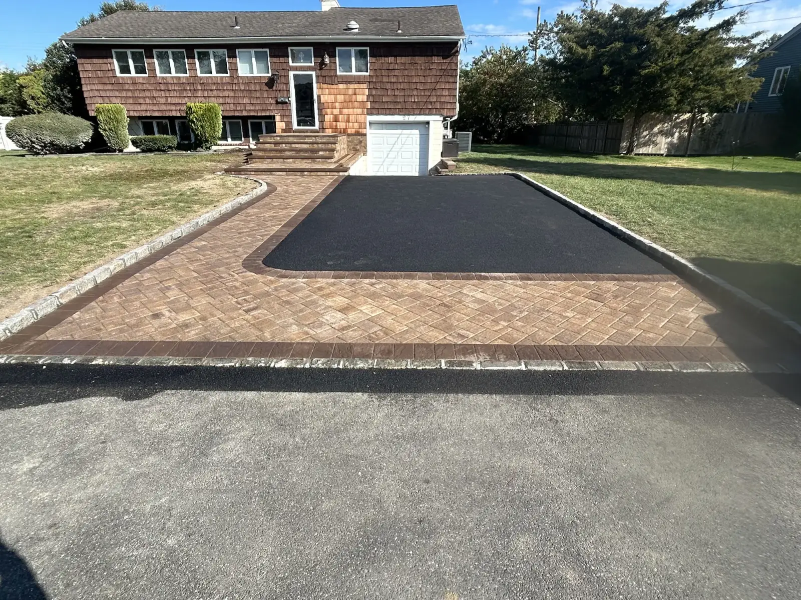 Asphalt and paver driveway with walkway by Promaster Maintenance Corp, Long Island, NY