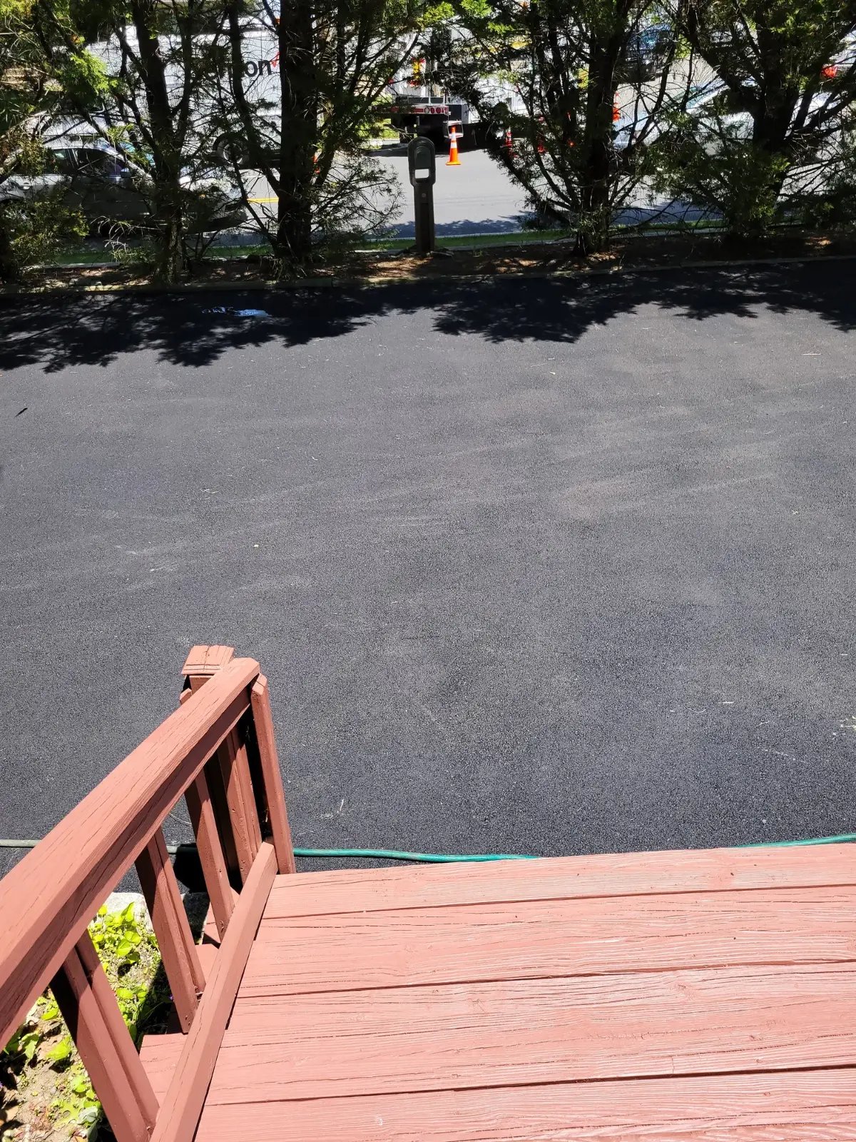 Asphalt driveway resurfacing by Promaster Maintenance Corp, Long Island, NY