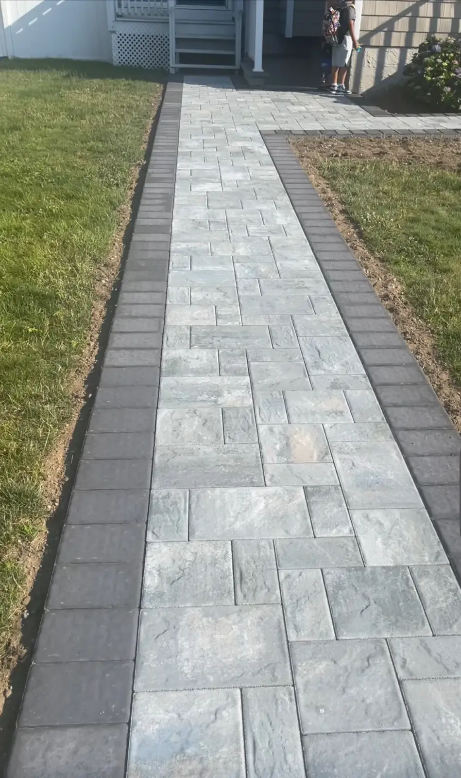 Paver walkway with charcoal border by Promaster Maintenance Corp, Long Island, NY