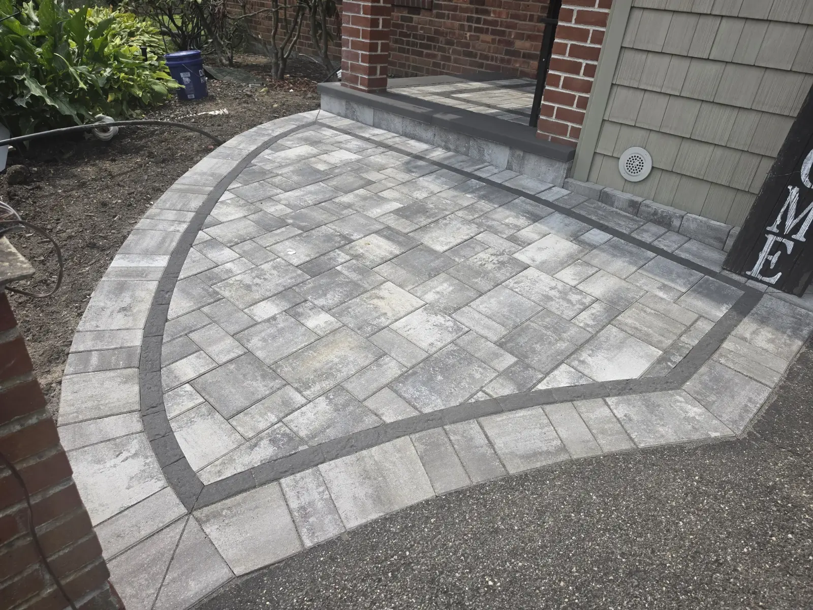 Curved paver landing by Promaster Maintenance Corp, Long Island, NY