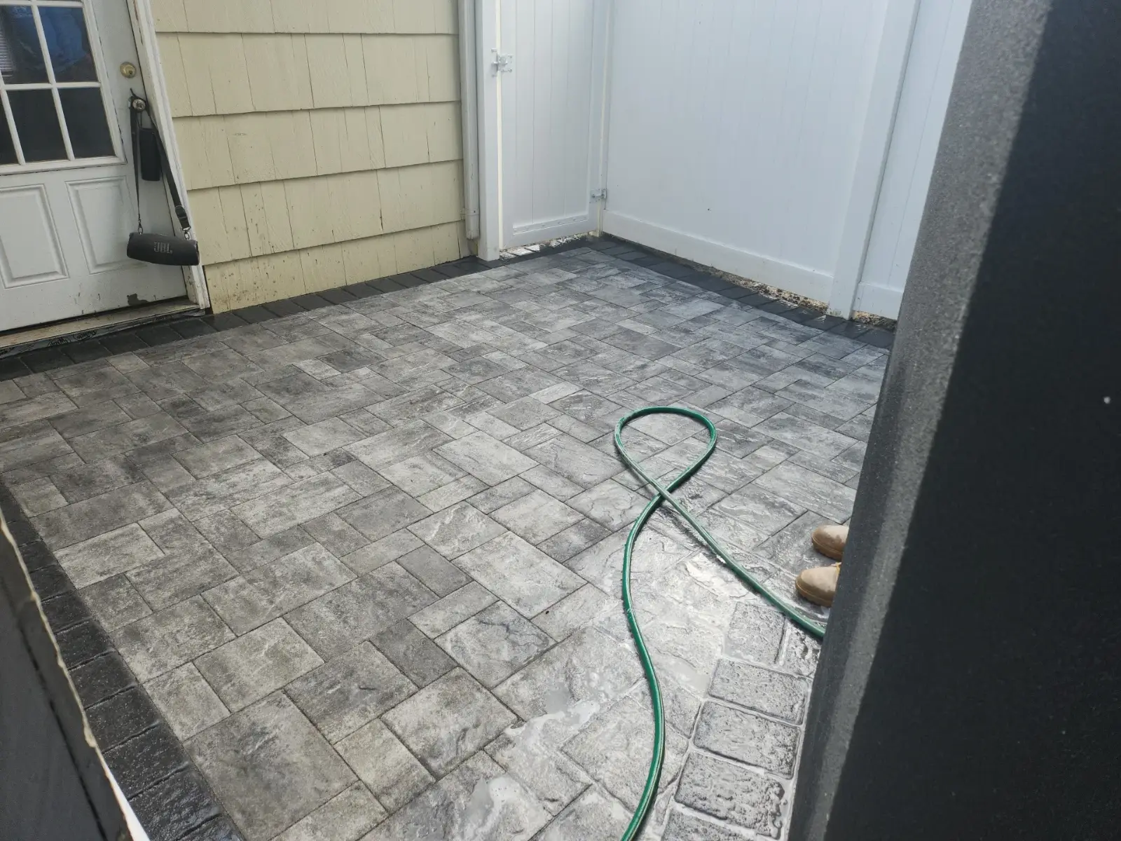 Side-yard paver patio by Promaster Maintenance Corp, Long Island, NY